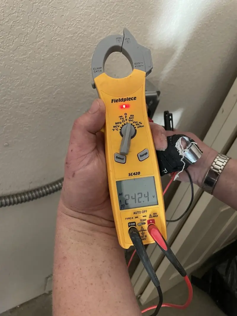 Voltage testing with clamp meter during Circuit Breaker Repair in Jamestown